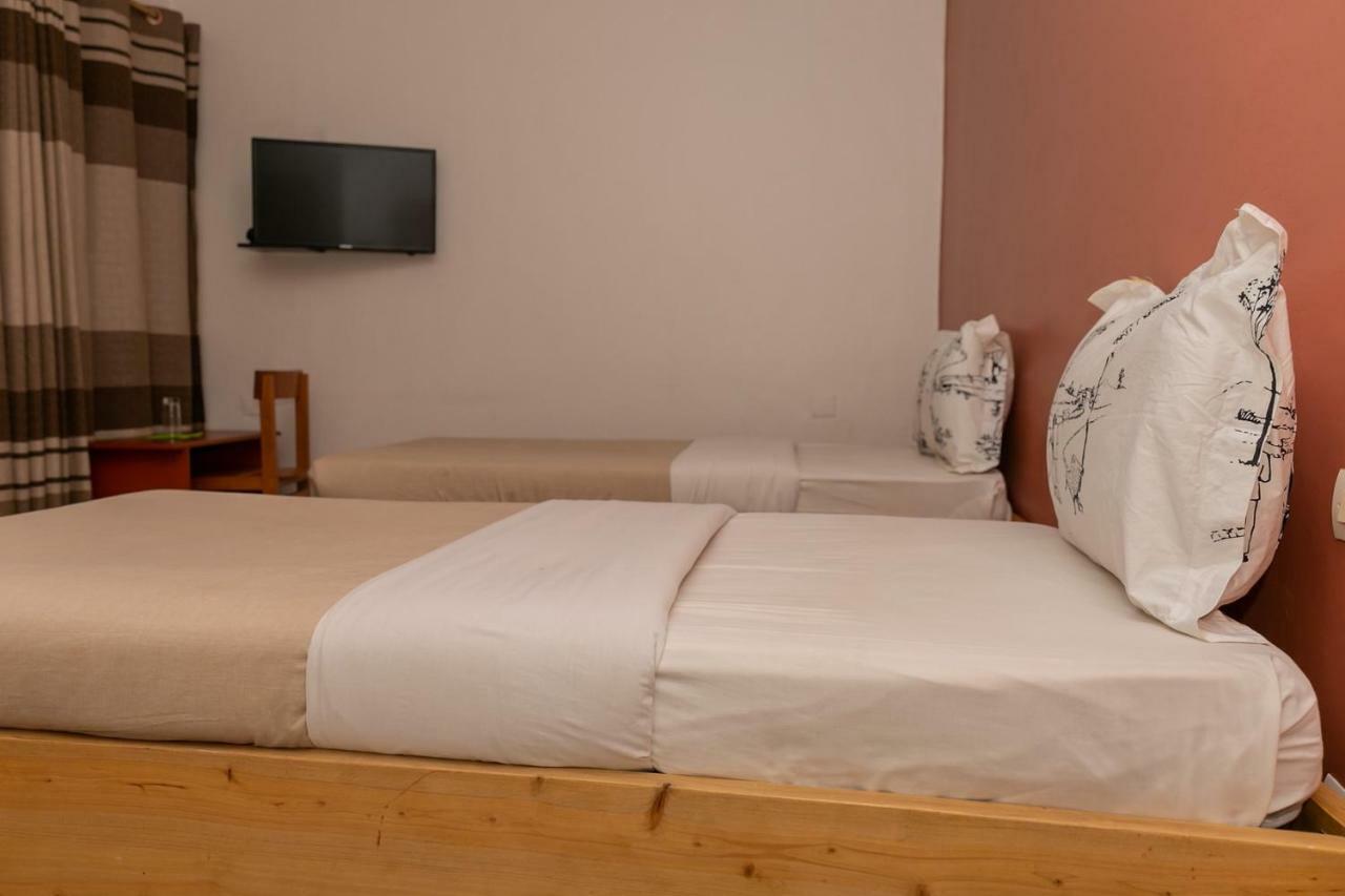 Perle Boutique Hotel Кигали Экстерьер фото