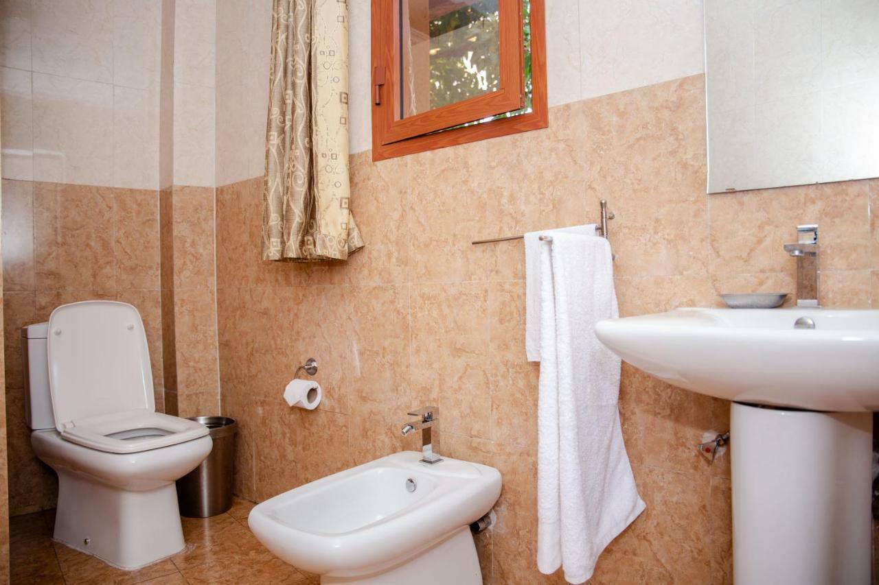 Perle Boutique Hotel Кигали Экстерьер фото